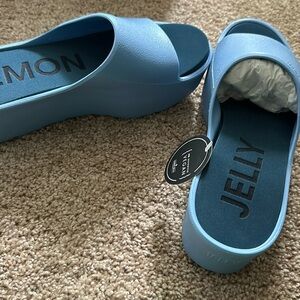 Brand new, never worn Lemon Jelly baby blue size 7.